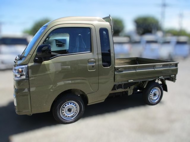 Daihatsu Hijet Jumbo Extra 4x4 Japanese mini truck in green khaki metallic with manual transmission that has hi-lo range