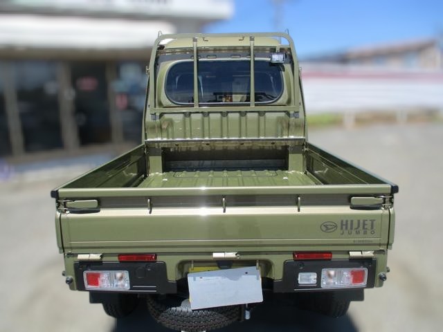 Daihatsu Hijet Jumbo Extra 4x4 Japanese mini truck in green khaki metallic with manual transmission that has hi-lo range