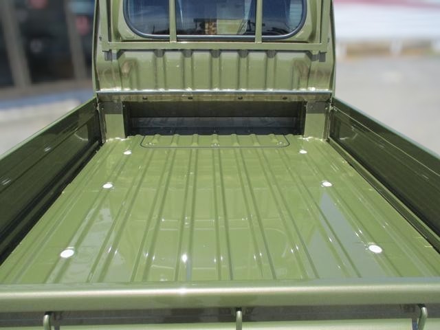 Daihatsu Hijet Jumbo Extra 4x4 Japanese mini truck in green khaki metallic with manual transmission that has hi-lo range