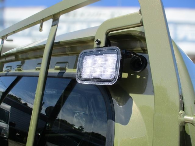 Daihatsu Hijet Jumbo Extra 4x4 Japanese mini truck in green khaki metallic with manual transmission that has hi-lo range