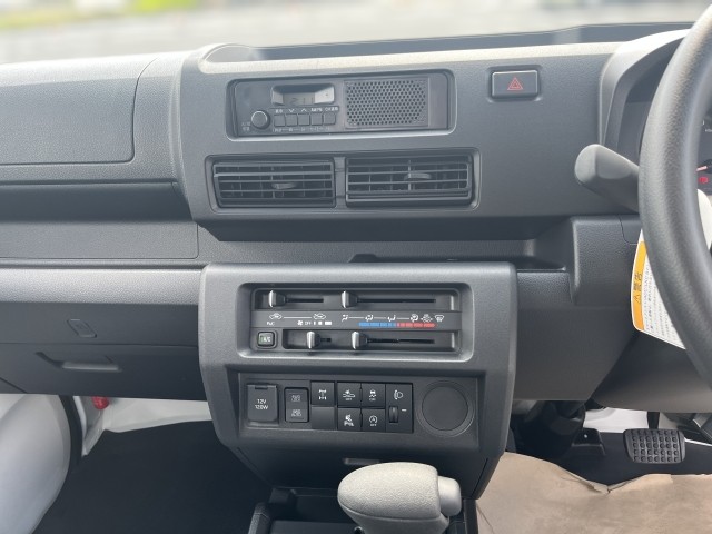 White 2025 Daihatsu Hijet LD Dump 4x4 Japanese mini truck in white with CVT transmission and delivery miles