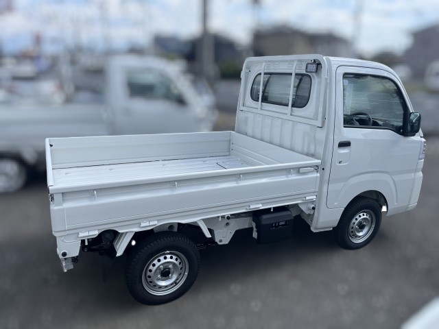 White 2025 Daihatsu Hijet LD Dump 4x4 Japanese mini truck in white with CVT transmission and delivery miles
