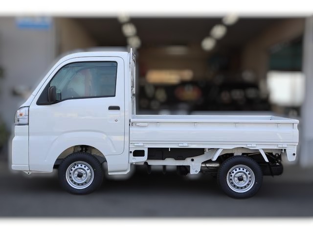 2025 Daihatsu Hijet regular cab Japanese mini truck with 4x4, AC & heat, and a 6ft 8 inch bed