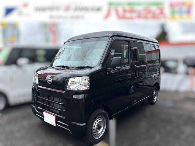 Daihatsu Hijet Cargo Deluxe model in black metallic paint -- 4x4 Japanese mini truck with CVT transmission