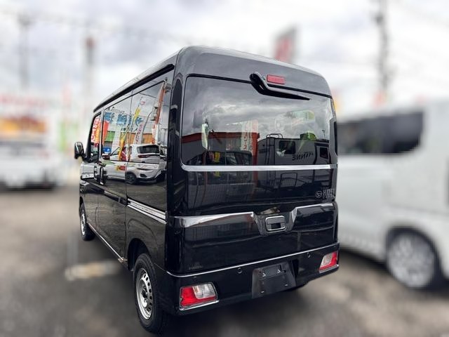 Daihatsu Hijet Cargo Deluxe model in black metallic paint -- 4x4 Japanese mini truck with CVT transmission