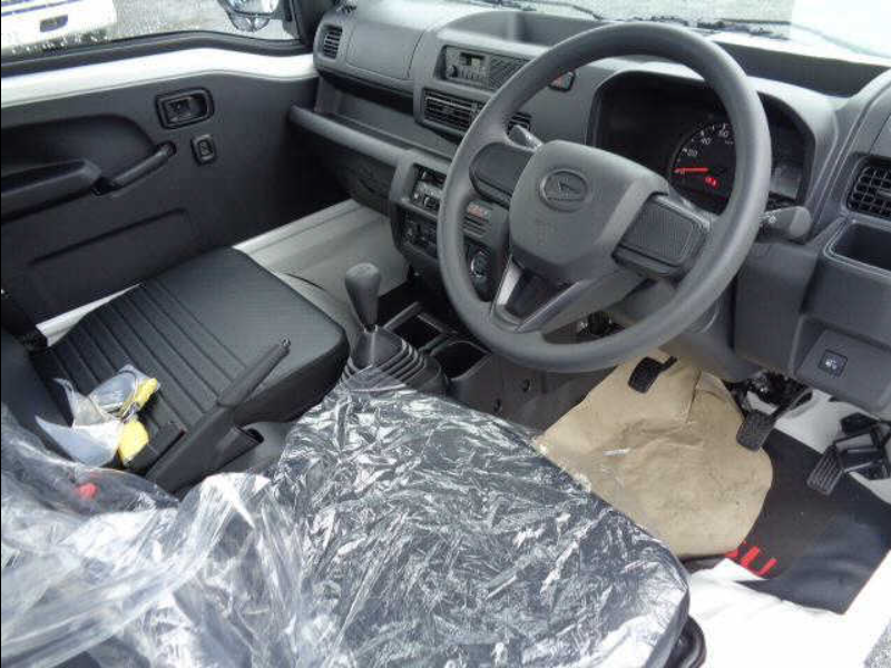 White 2024 Daihatsu Hijet Regular Cab 4x4 Japanese mini truck with rear tail gate lift