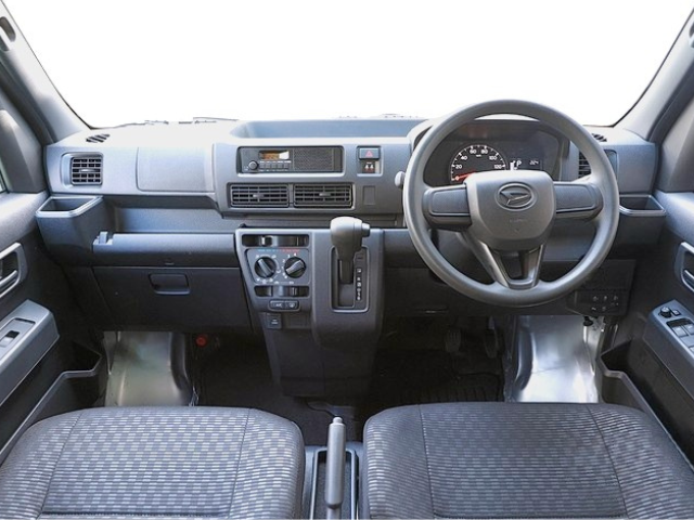 Front seats and dashboard of CVT Daihatsu Hijet Cargo 4x4 Japanese mini truck