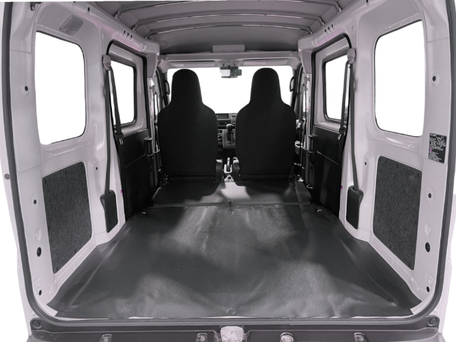 Rear cargo area with flat floor and rear seat removed in the Daihatsu Hijet Cargo 4x4 Japanese mini truck