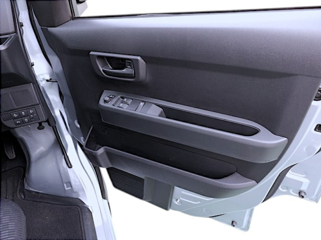 Front door power window and power door mirror controls in the Daihatsu Hijet Cargo 4x4 Japanese mini truck