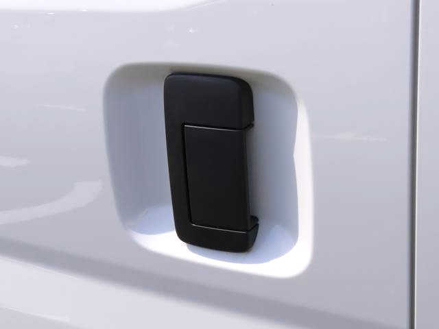Rear sliding door outside handle of a Daihatsu Hijet Cargo 4x4 Japanese mini truck