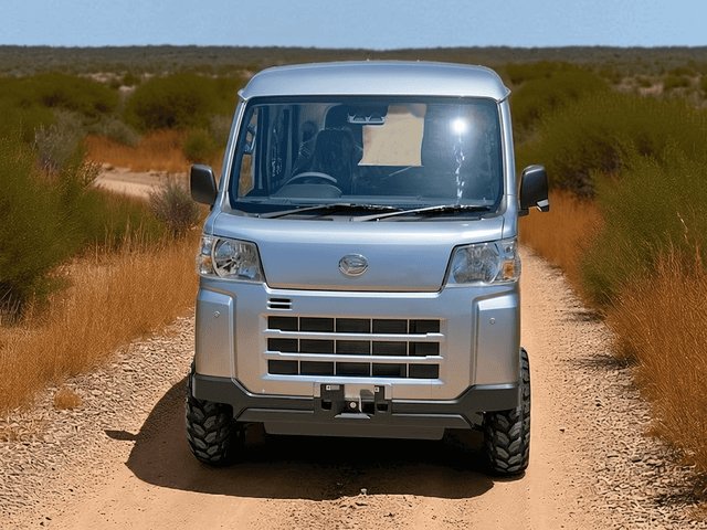 Daihatsu Hijet Deckvan in silver 4x4 Japanese mini truck from front