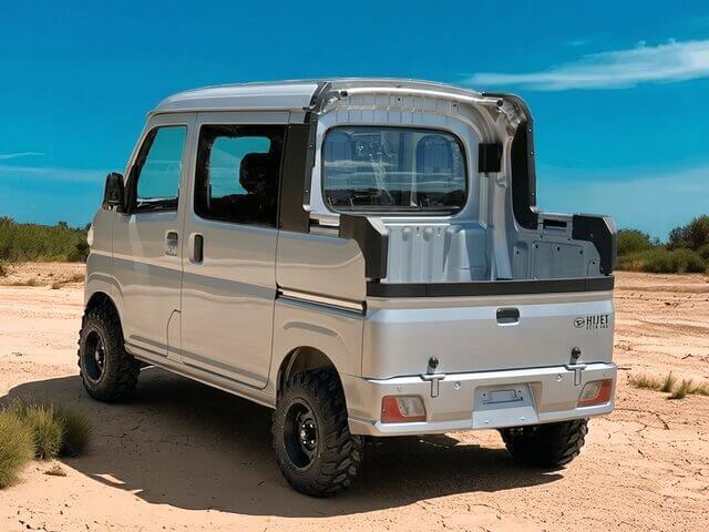 Daihatsu Hijet Deckvan in silver 4x4 off-road Japanese mini truck from left rear