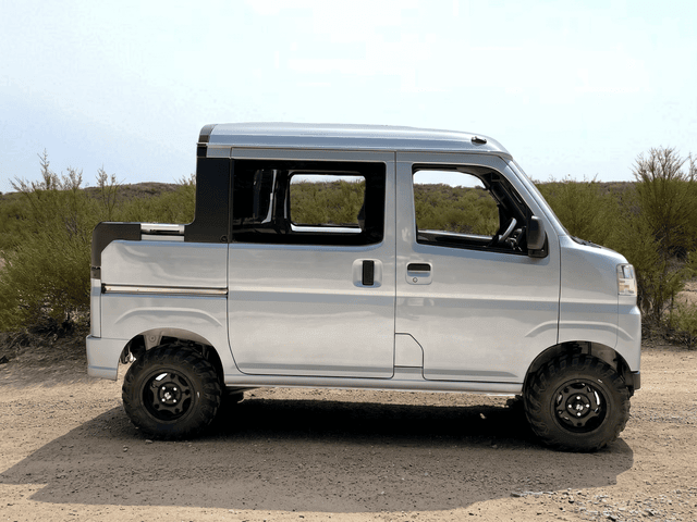 Daihatsu Hijet Deckvan in silver 4x4 Japanese mini truck from right side