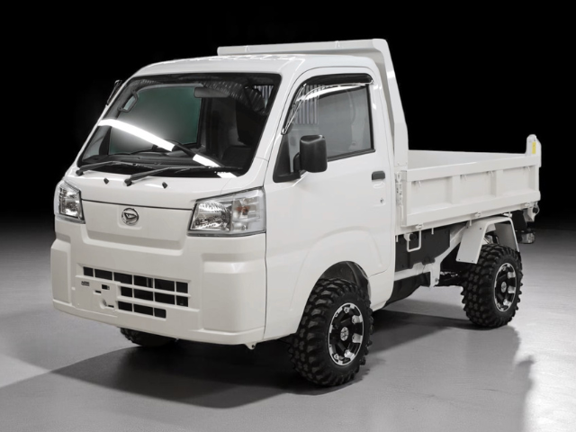 Studio shot of Daihatsu Hijet HD Dump left front with bed lowered