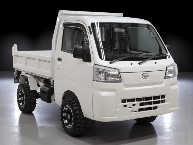 Studio shot of Daihatsu Hijet HD Dump from left front with bed down
