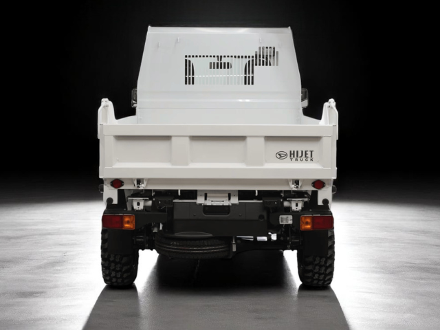 Studio shot of Daihatsu Hijet HD Dump from behind
